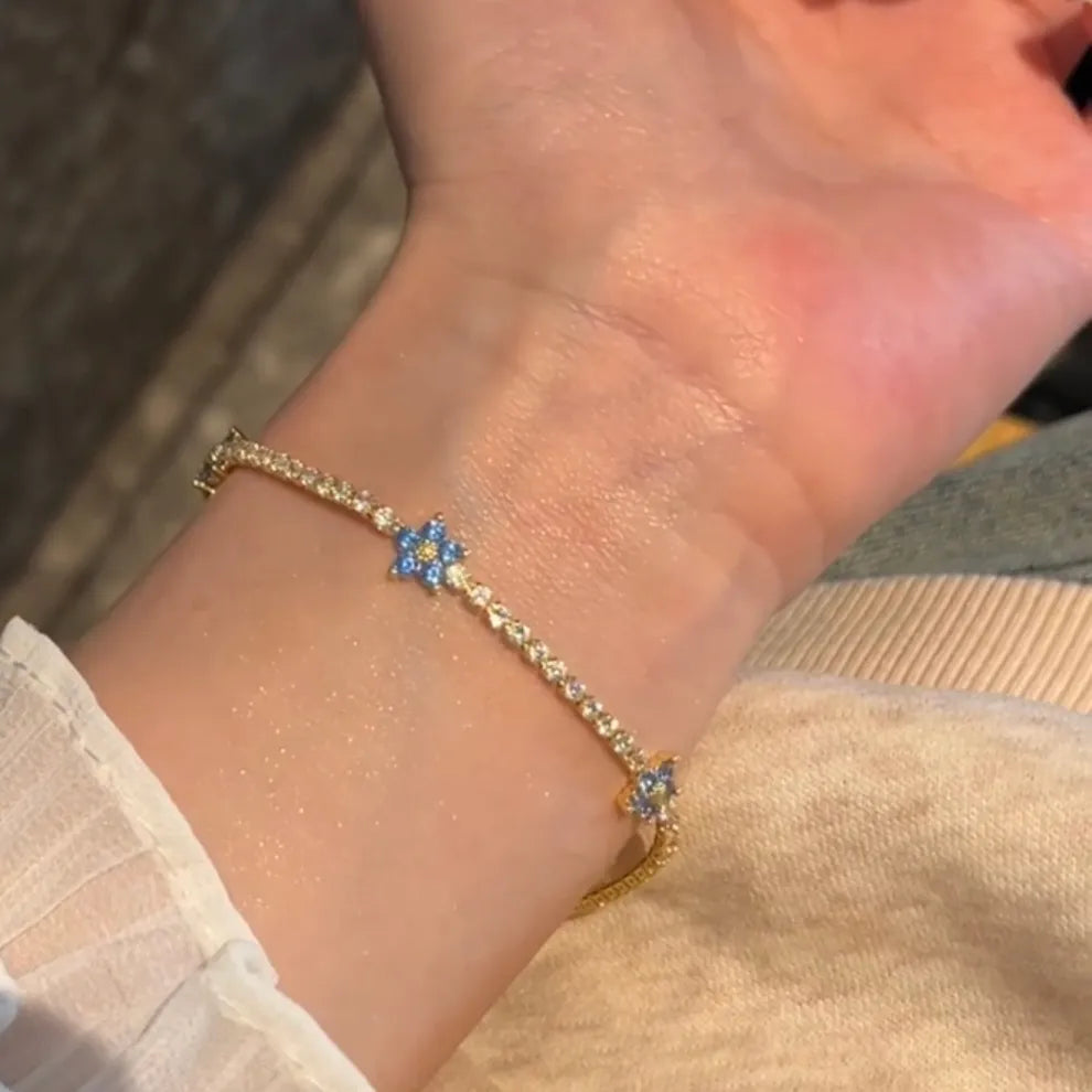 Silver Coated Flower Tennis Bracelet